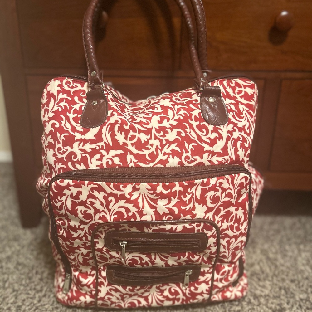 Red and White Travel Bag with Elegant Pattern